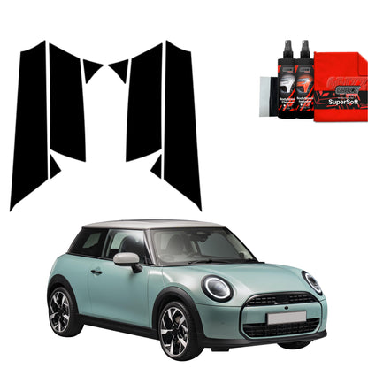 A 2023 Mini Cooper S with GrizzProtector 8-in-1 black B-C-pillar film and a car cleaning kit with red cloths.